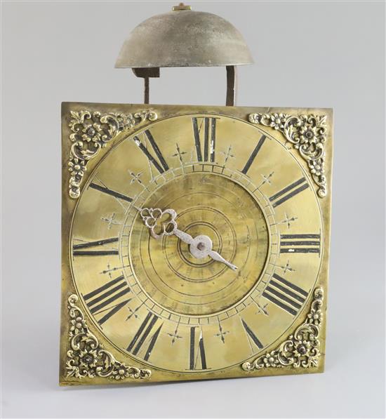 An early 18th century brass and wrought iron birdcage dial wall clock, dial 9in., overall height 12in.